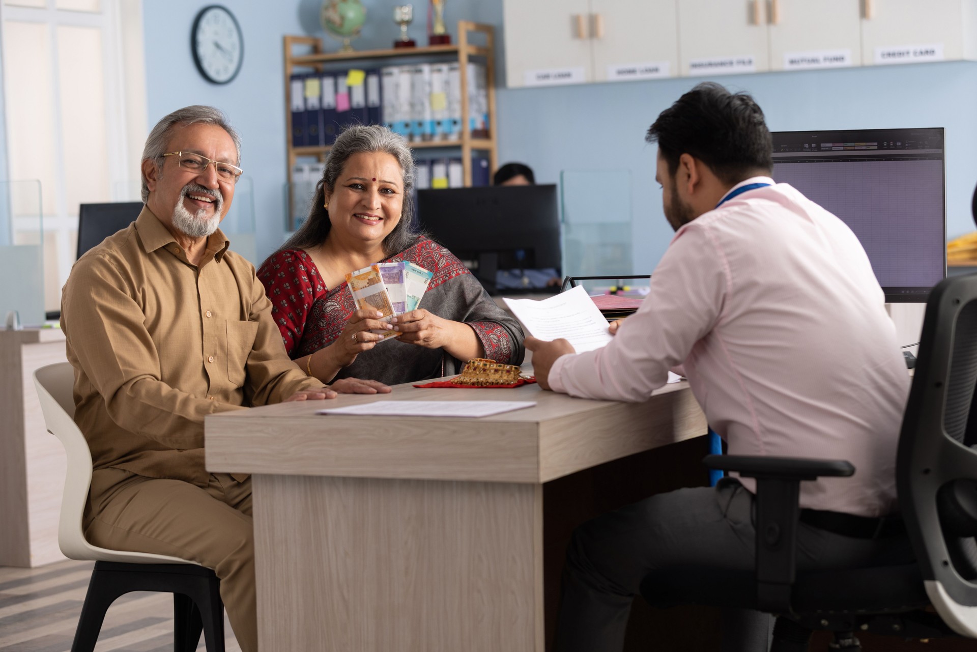 Senior Couple Meeting with Financial advisor stock photo